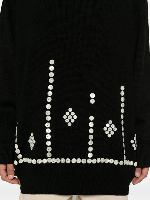 Maglione con bottoni decorativi